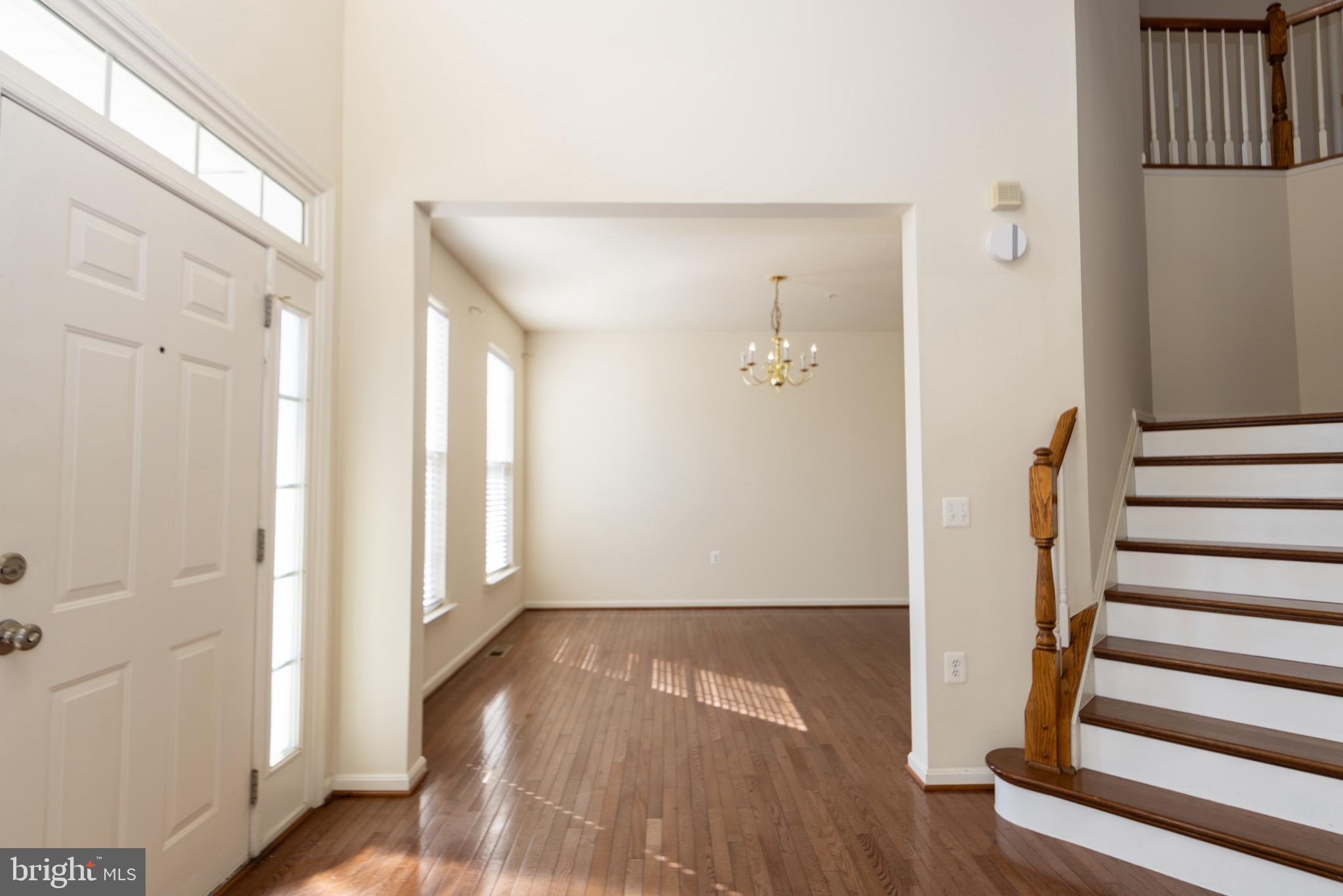 9814 Traver Street Bowie, MD 20721 - Photo 4 of 75 a view of entryway with wooden floor