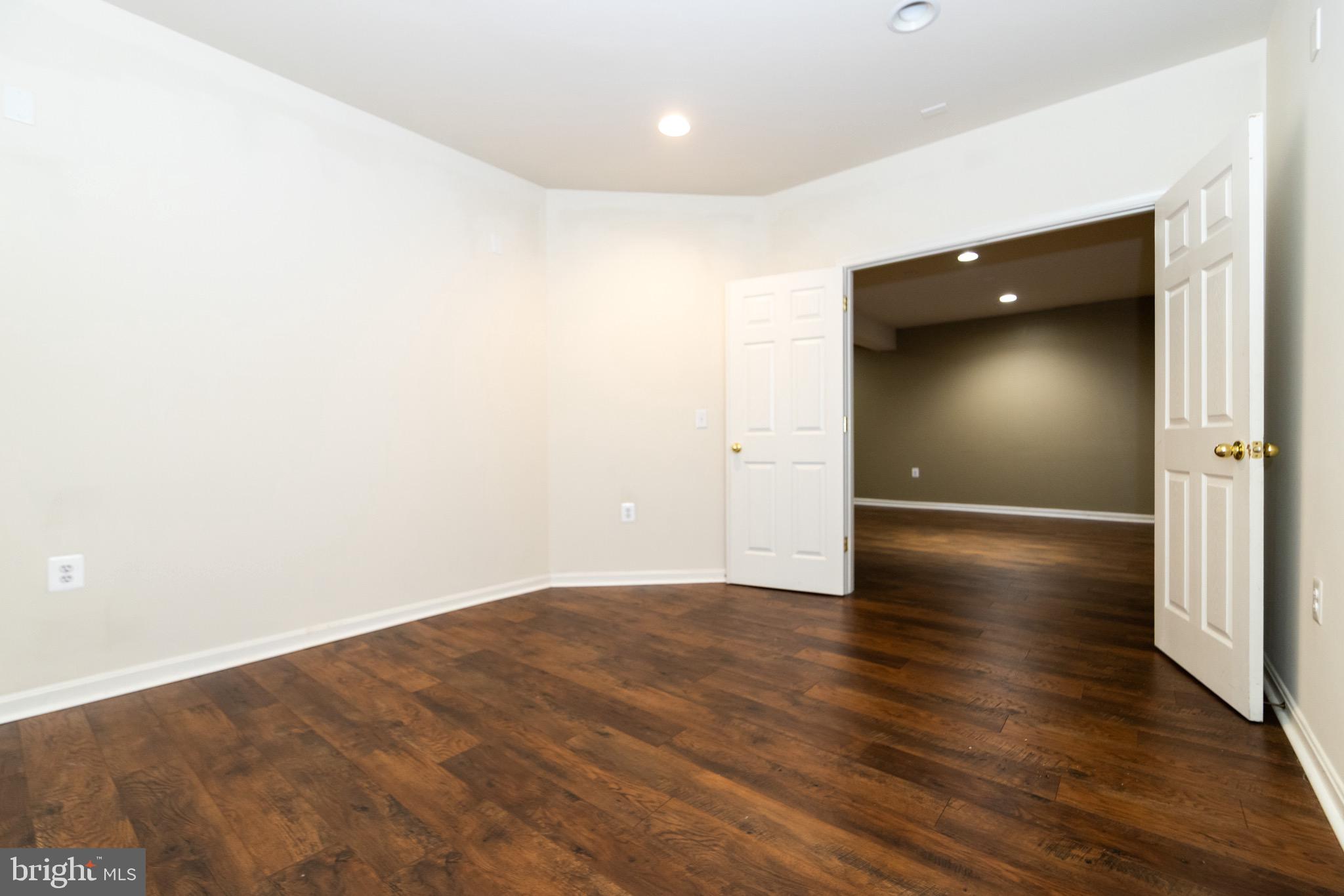 9814 Traver Street Bowie, MD 20721 - Photo 61 of 75 a view of empty room with wooden floor