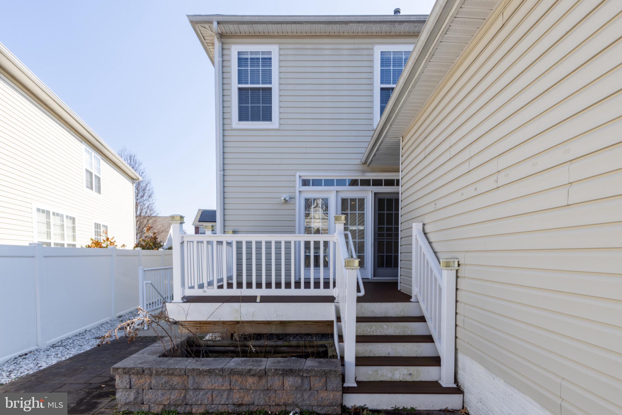 9814 Traver Street Bowie, MD 20721 - Photo 69 of 75 a view of entryway with wooden stairs