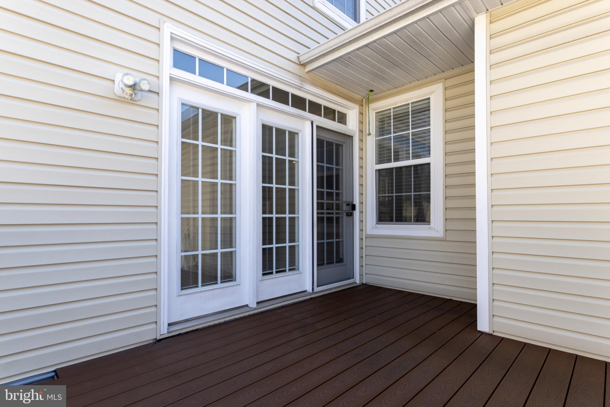 9814 Traver Street Bowie, MD 20721 - Photo 71 of 75 a view of front door and deck of the house