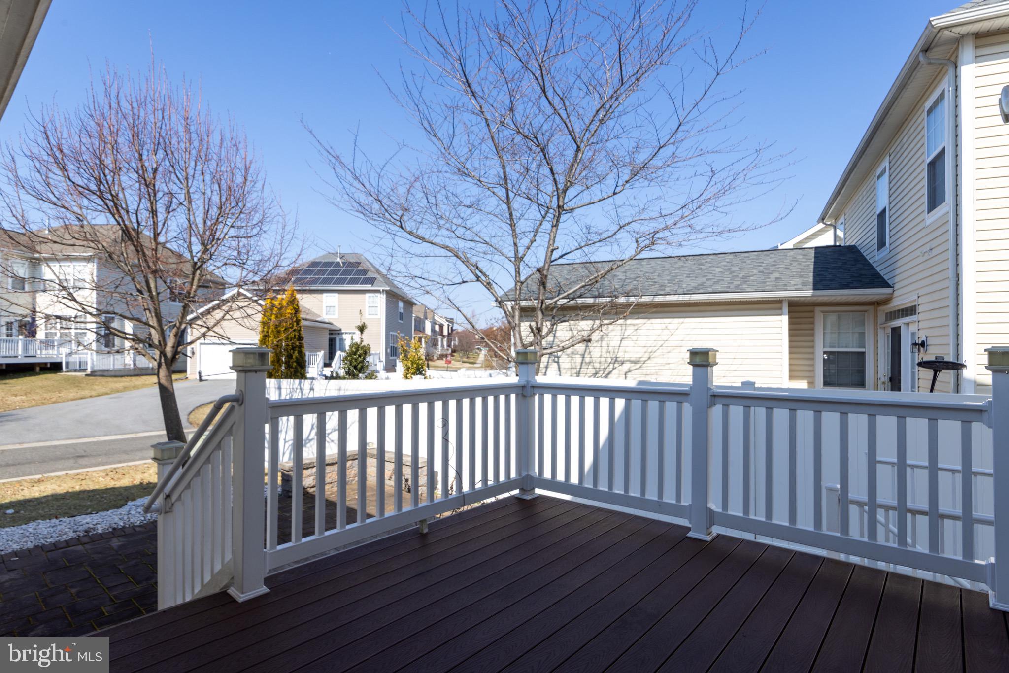 9814 Traver Street Bowie, MD 20721 - Photo 72 of 75 a view of a wooden deck and a yard