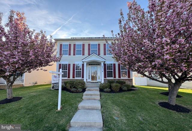 9814 Traver Street Bowie, MD 20721 - Photo 75 of 75 a front view of a house with garden