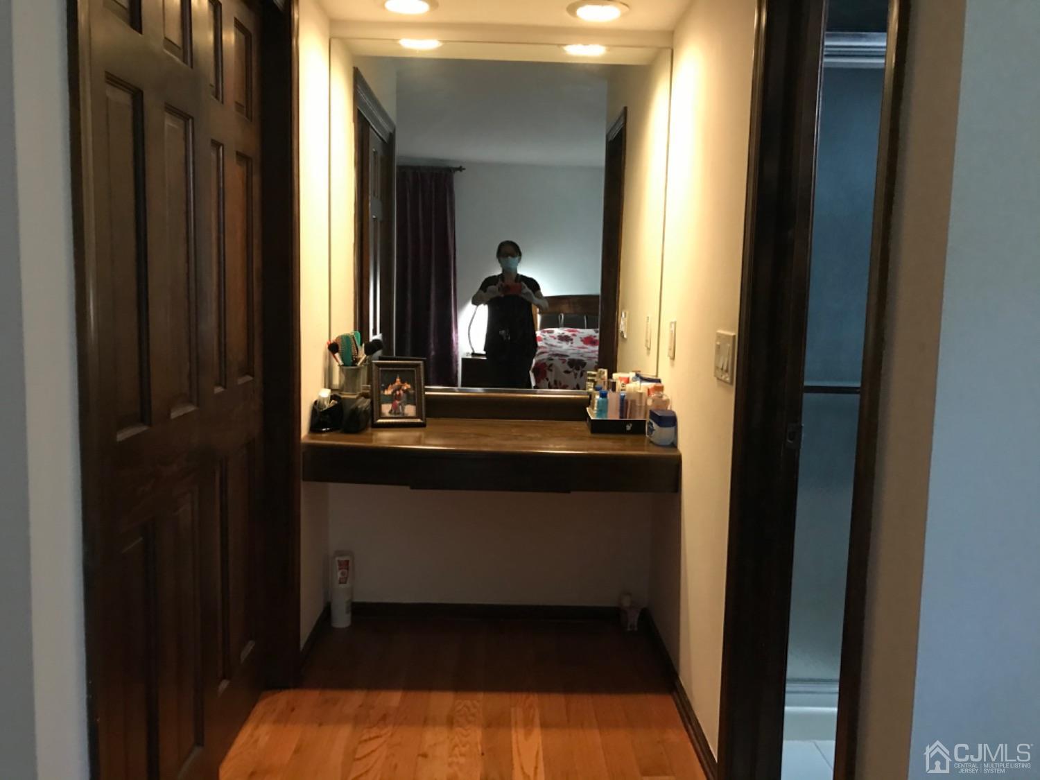 27 Fox Hill Road Edison, NJ 08820 - Photo 15 of 27 a bathroom with a sink and a mirror