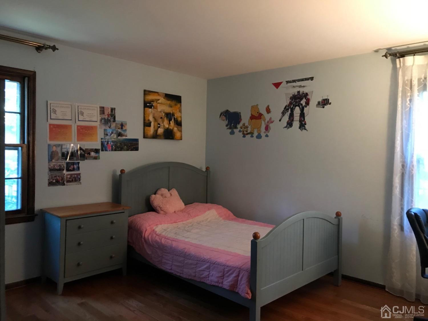 27 Fox Hill Road Edison, NJ 08820 - Photo 18 of 27 a bedroom with a bed and a window