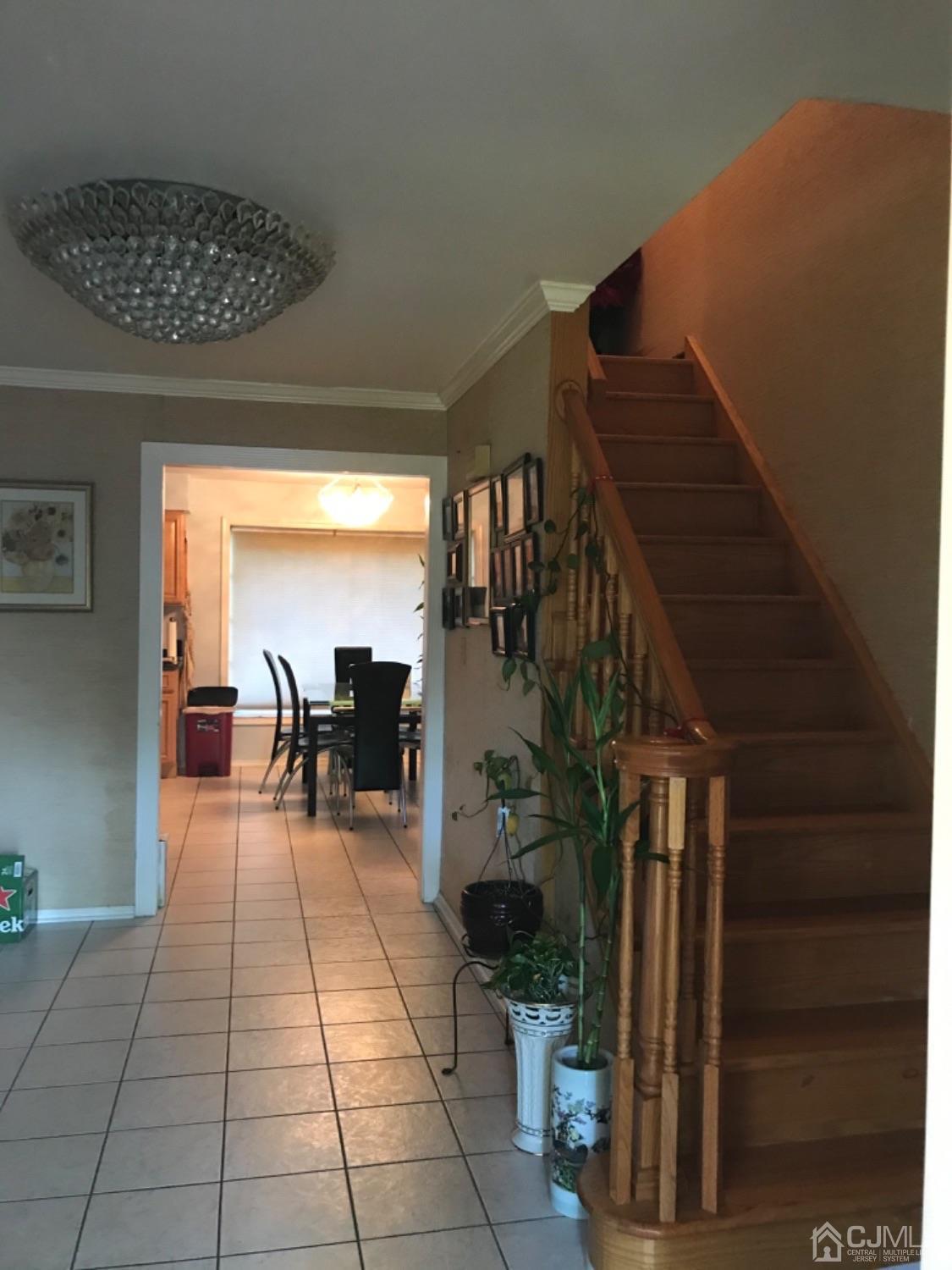 27 Fox Hill Road Edison, NJ 08820 - Photo 3 of 27 a view of entryway and hall with a living room