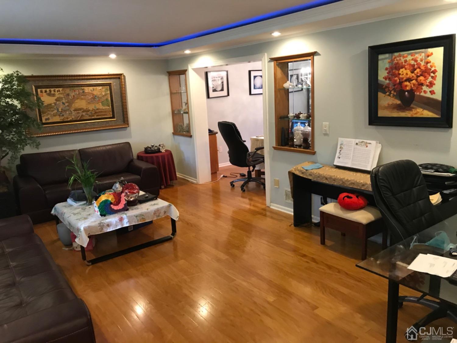 27 Fox Hill Road Edison, NJ 08820 - Photo 4 of 27 a living room with furniture and a couch