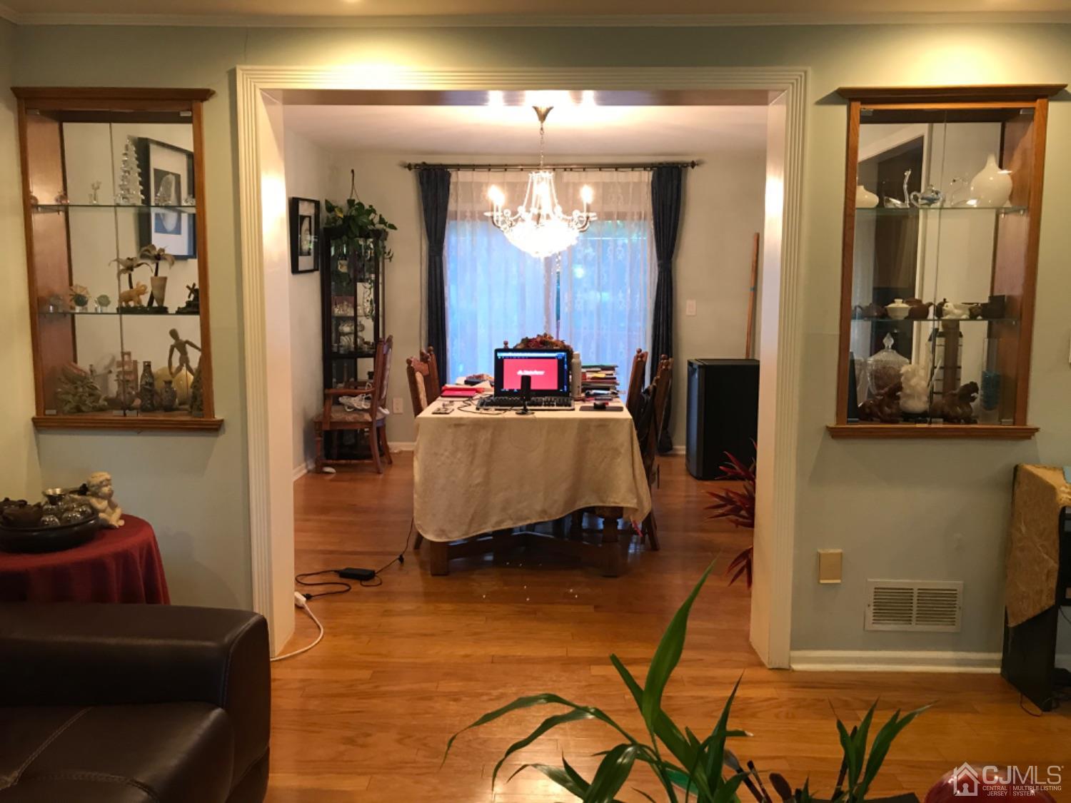 27 Fox Hill Road Edison, NJ 08820 - Photo 5 of 27 a living room with furniture and a flat screen tv