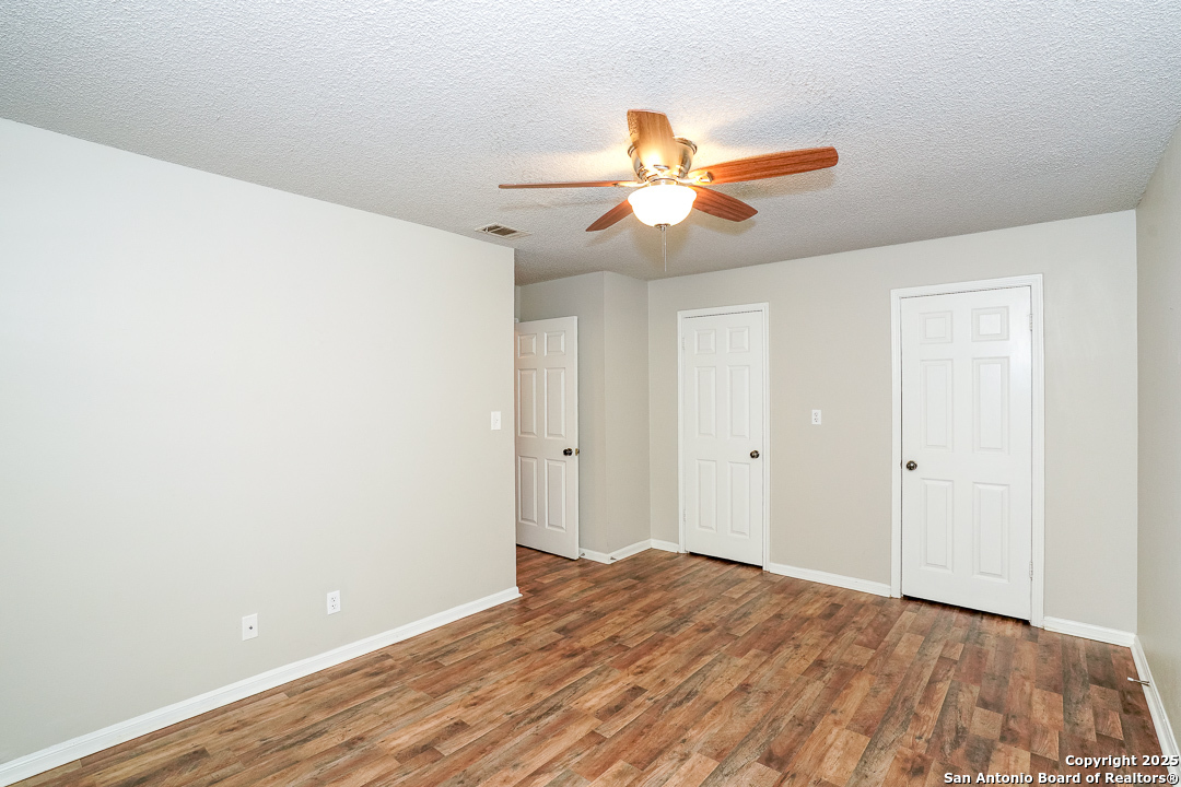 11843 Braesview, Unit 1612 San Antonio, TX 78231 - Photo 22 of 31 a view of empty room with wooden floor