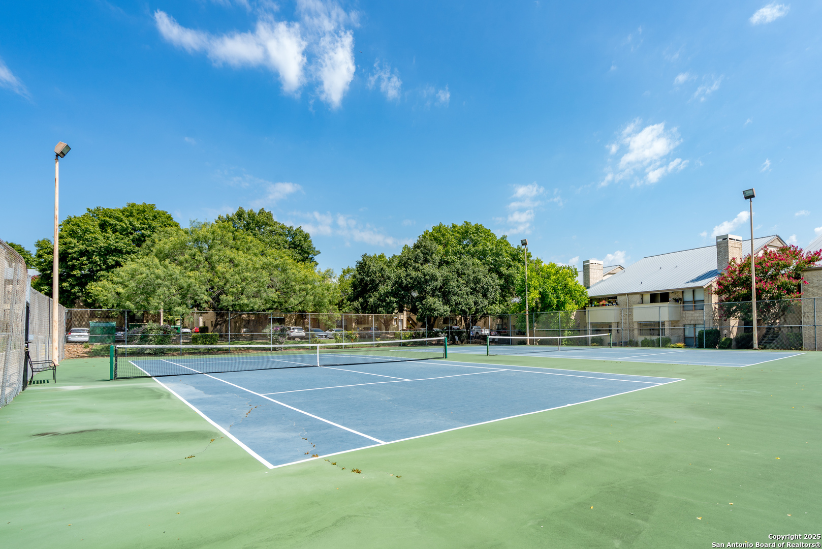 11843 Braesview, Unit 1612 San Antonio, TX 78231 - Photo 30 of 31 a view of a tennis court
