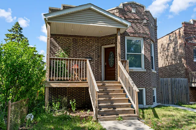 front view of a house with a small yard