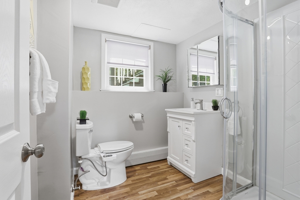 33 Simon Willard Road Acton, MA 01720 - Photo 29 of 42 a bathroom with a sink toilet and shower