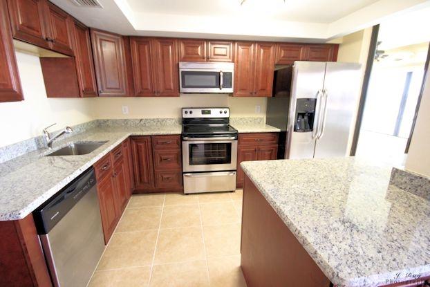 1648 Jupiter Cove Drive Jupiter, FL 33469 - Photo 5 of 21 Kitchen1