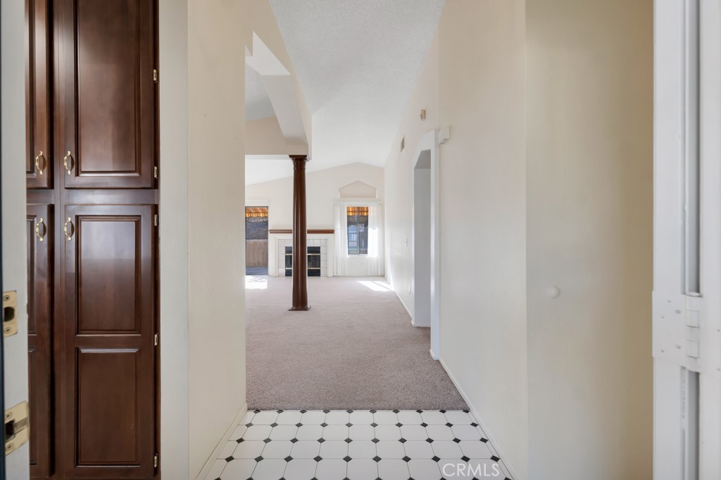 1440 Fox Run Corona, CA 92882 - Photo 3 of 23 a bathroom with a sink and mirror