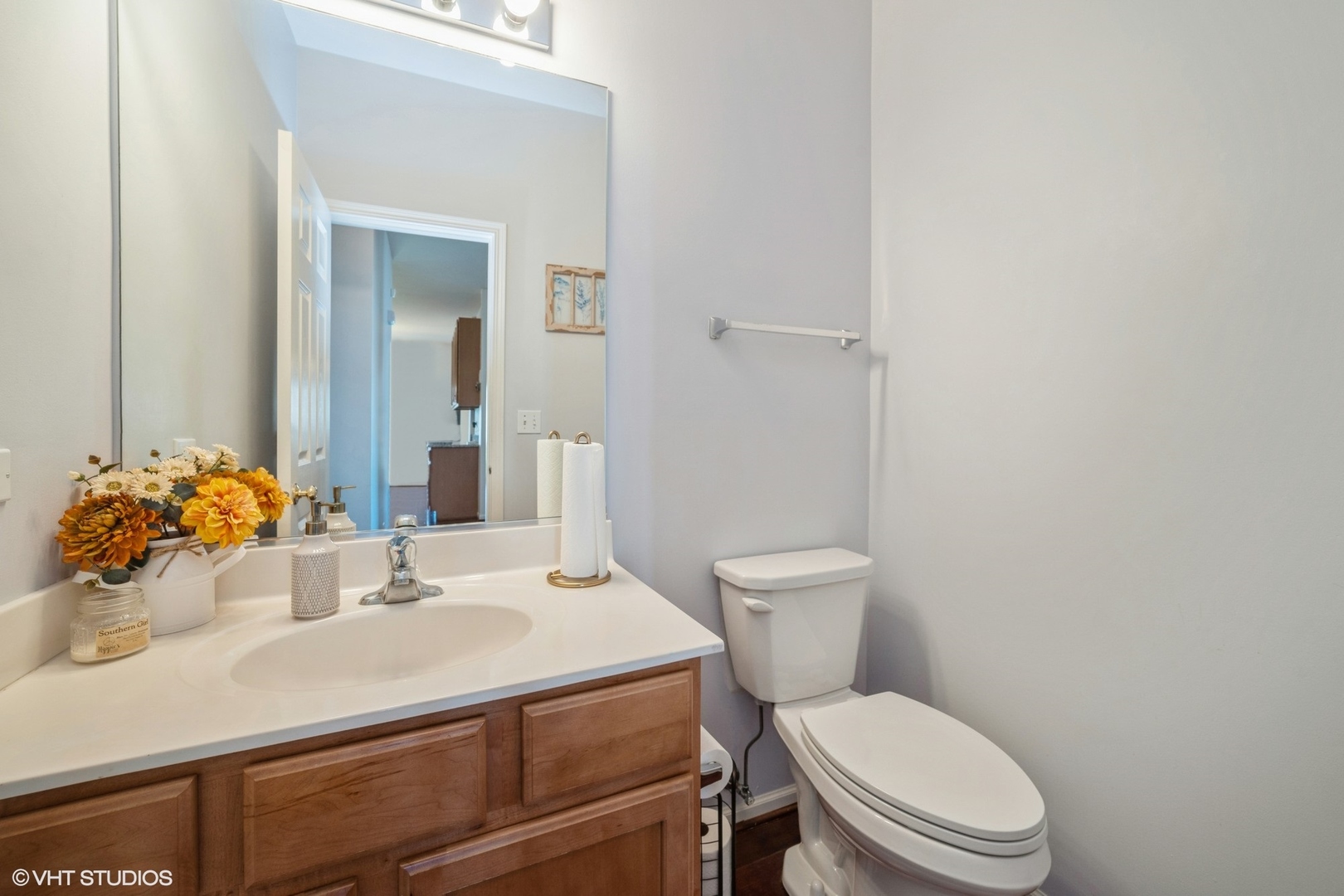 2624 Maple Circle West Dundee, IL 60118 - Photo 13 of 37 a bathroom with a sink a toilet and mirror