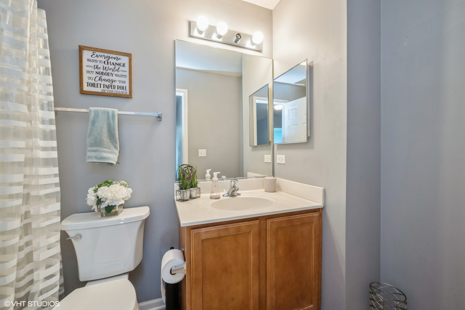 2624 Maple Circle West Dundee, IL 60118 - Photo 20 of 37 a bathroom with a sink vanity mirror and toilet