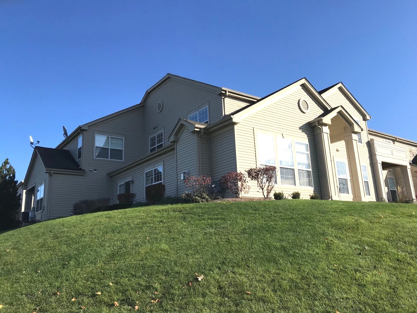 2624 Maple Circle West Dundee, IL 60118 - Photo 32 of 37 a view of a house with a big yard and large tree