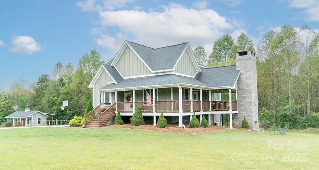 a view of a house with a garden and plants