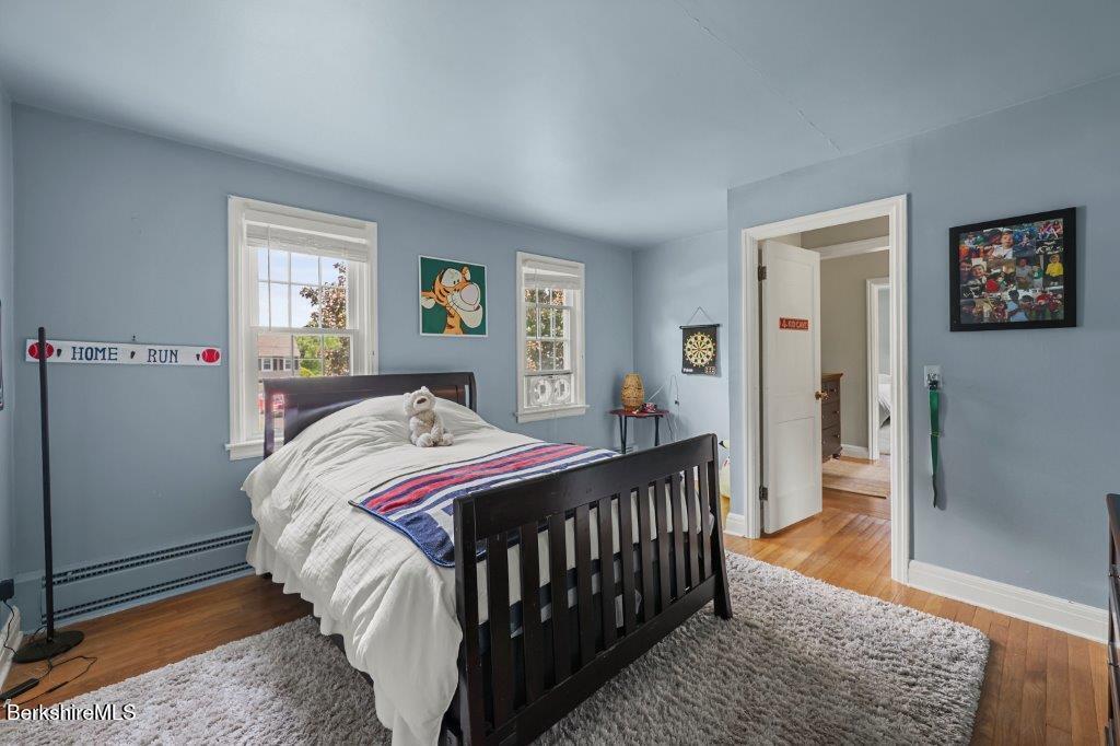 33 Eleanor Road Pittsfield, MA 01201 - Photo 32 of 45 a bedroom with a bed and a window
