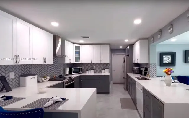 $738,990 | 8275 Shadow Wood Boulevard, Coral Springs, FL 33071