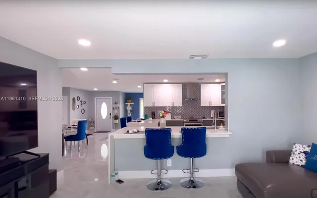 $738,990 | 8275 Shadow Wood Boulevard, Coral Springs, FL 33071