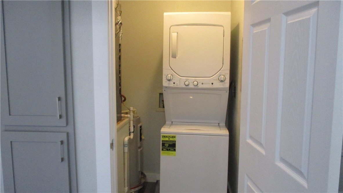 6702 Everhart Road, Unit H109 Corpus Christi, TX 78413 - Photo 11 of 18 a close up view of a washer and dryer