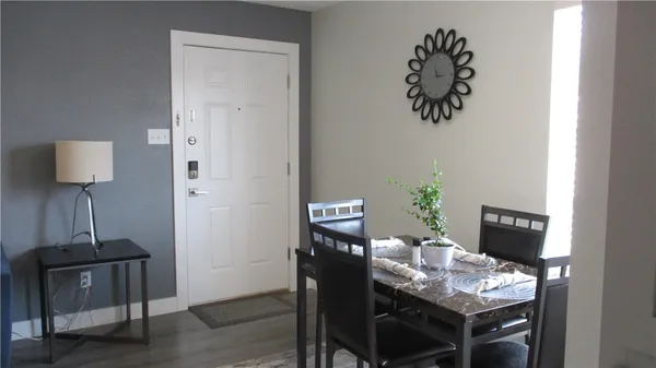 a workspace with furniture and wooden floor