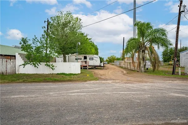 a view of road and trees