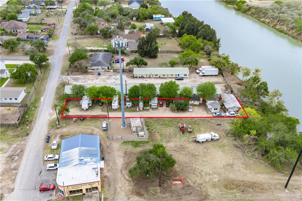 106 South Arroyo Boulevard Rio Hondo, TX 78583 - Photo 7 of 18 an aerial view of a residential houses with outdoor space