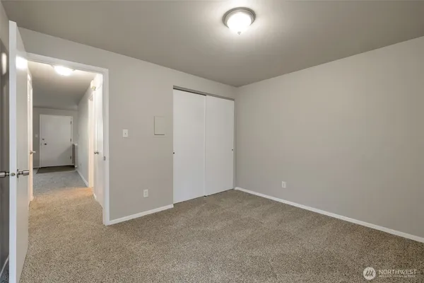 an empty room with a bathroom