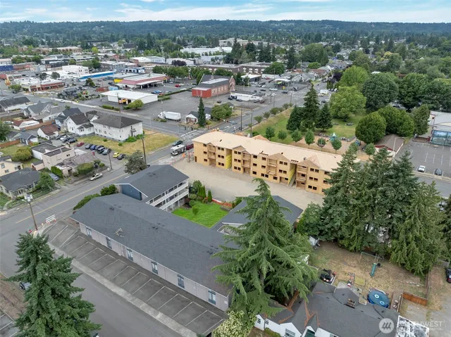 an aerial view of a city with lots of residential buildings