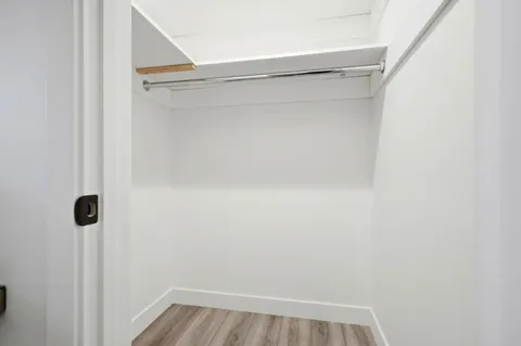 a view of a room with rack on the wall