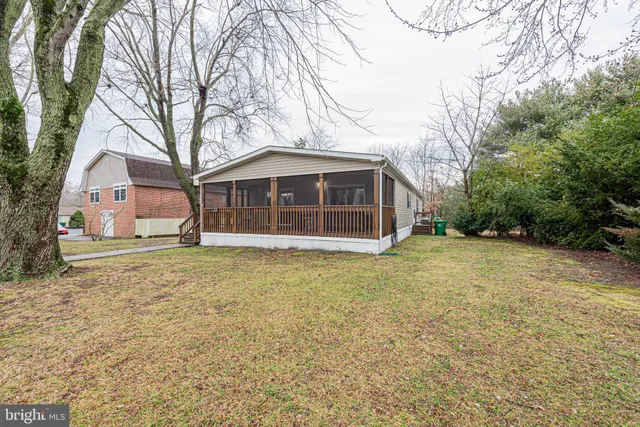 a house with trees in front of it