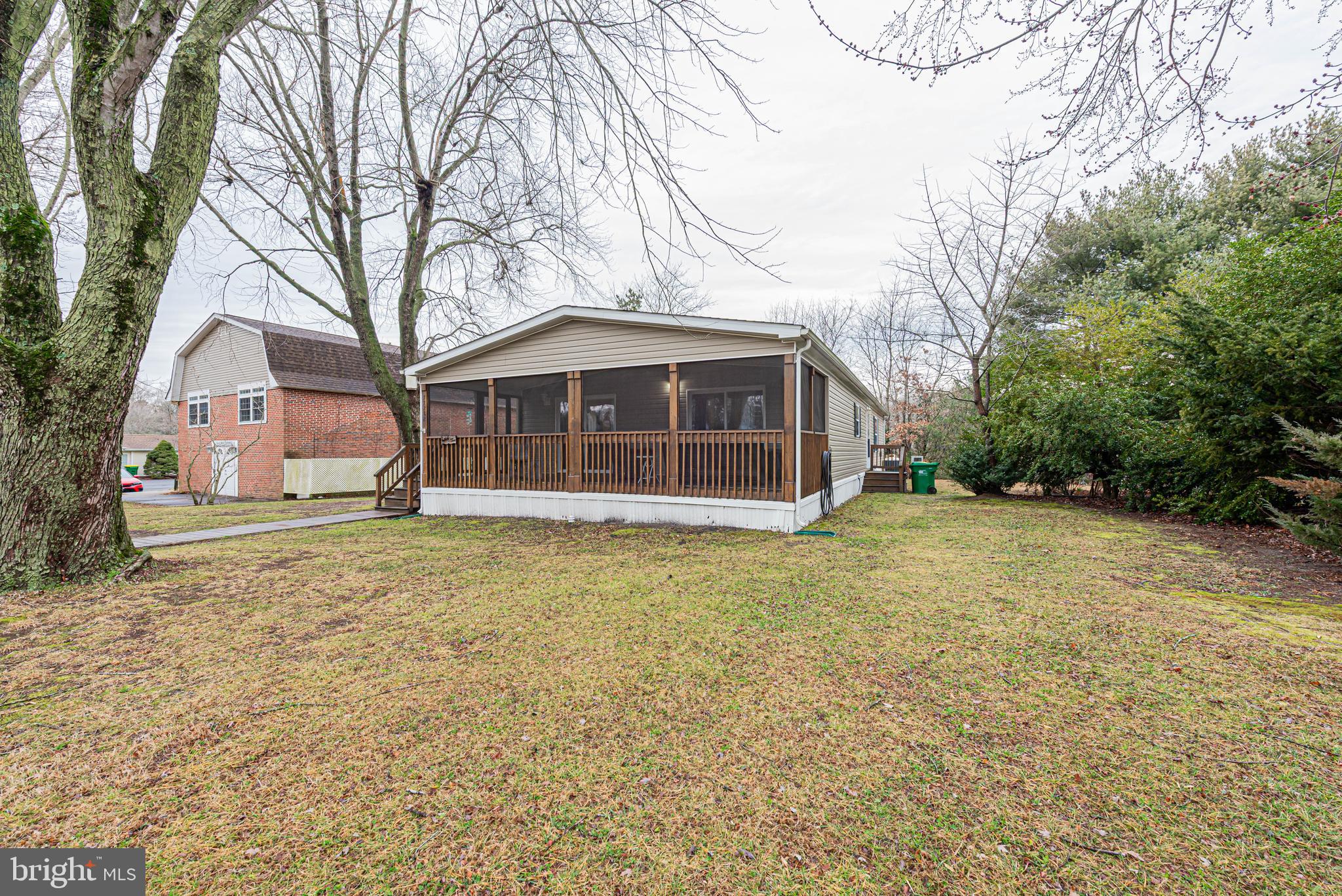 17282 Ridge Line Drive Lewes, DE 19958 - Photo 31 of 31 a house with trees in front of it