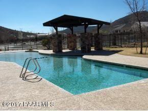 7234 Woolsey Ranch Road Prescott Valley, AZ 86314 - Photo 23 of 23 a view of a swimming pool with a patio