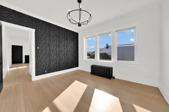 a living room with a couch and a window