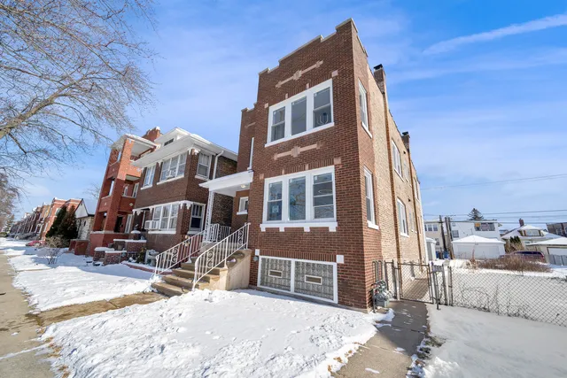 a street view with tall buildings