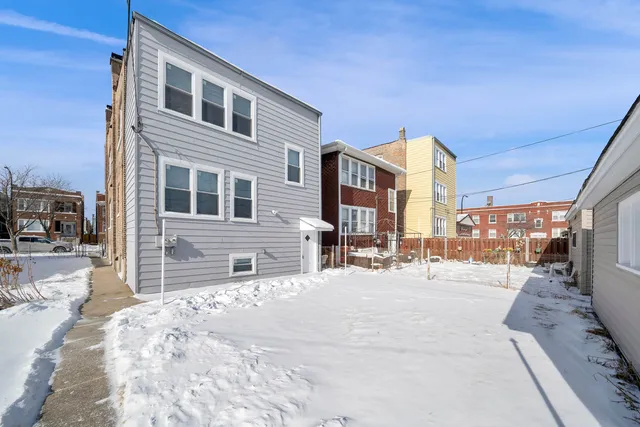 a front view of a building with street view