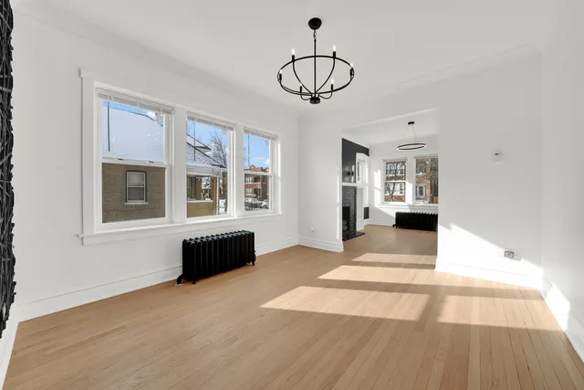 a living room with furniture and windows