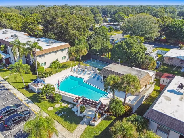 an aerial view of a house with a garden