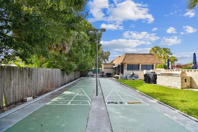 a view of a swimming pool with a lounge chairs