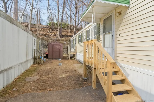 a view of entryway with a front door