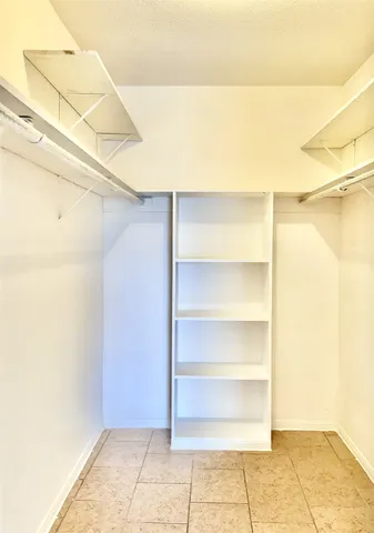 a view of a room with an empty space