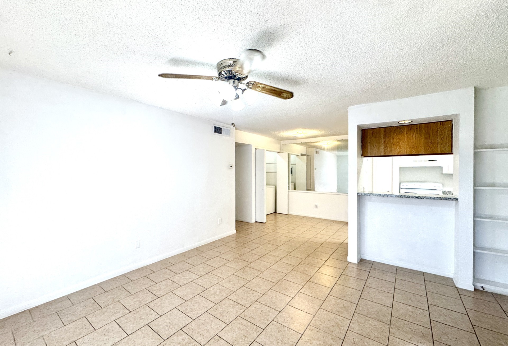 1516 Bay Area Boulevard, Unit U2 Houston, TX 77058 - Photo 6 of 15 a view of a livingroom with furniture and a flat screen tv