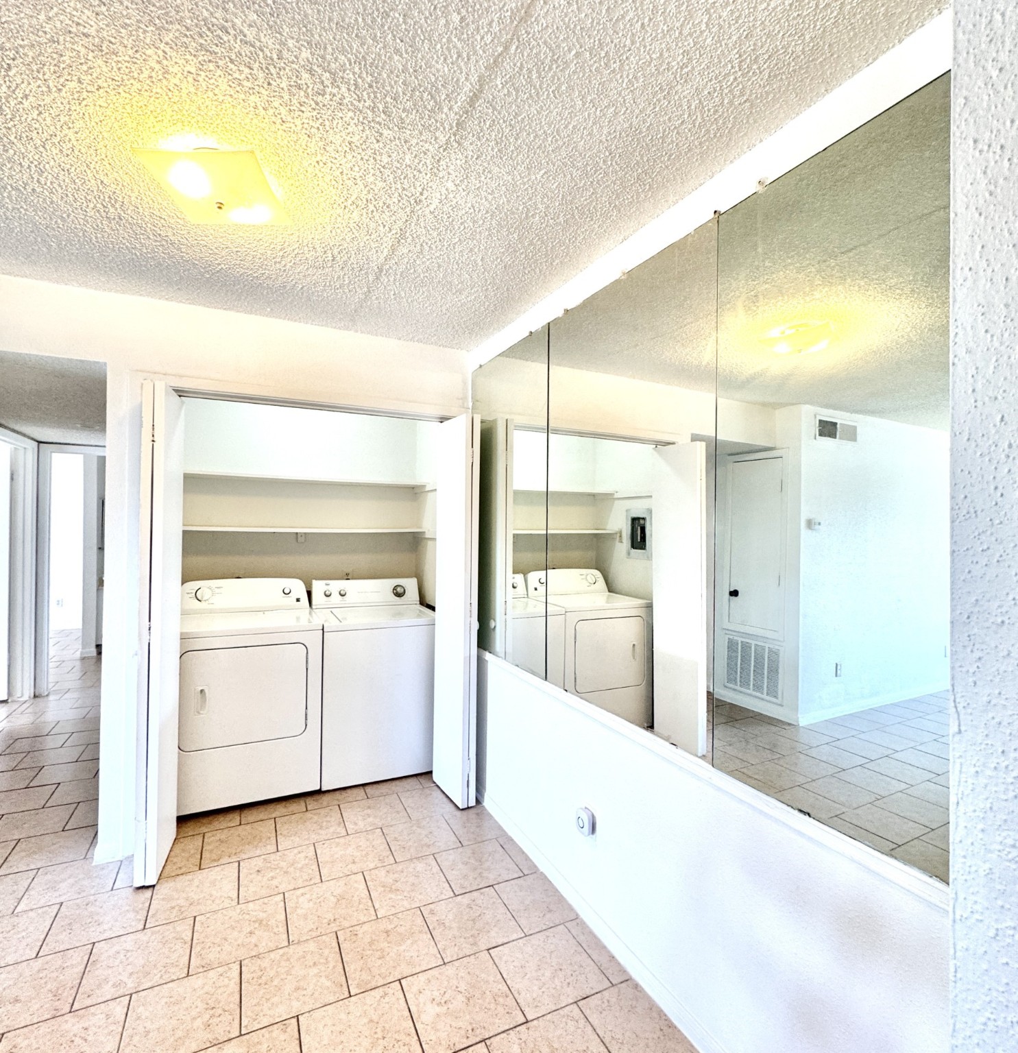 1516 Bay Area Boulevard, Unit U2 Houston, TX 77058 - Photo 7 of 15 a large white room with a large window