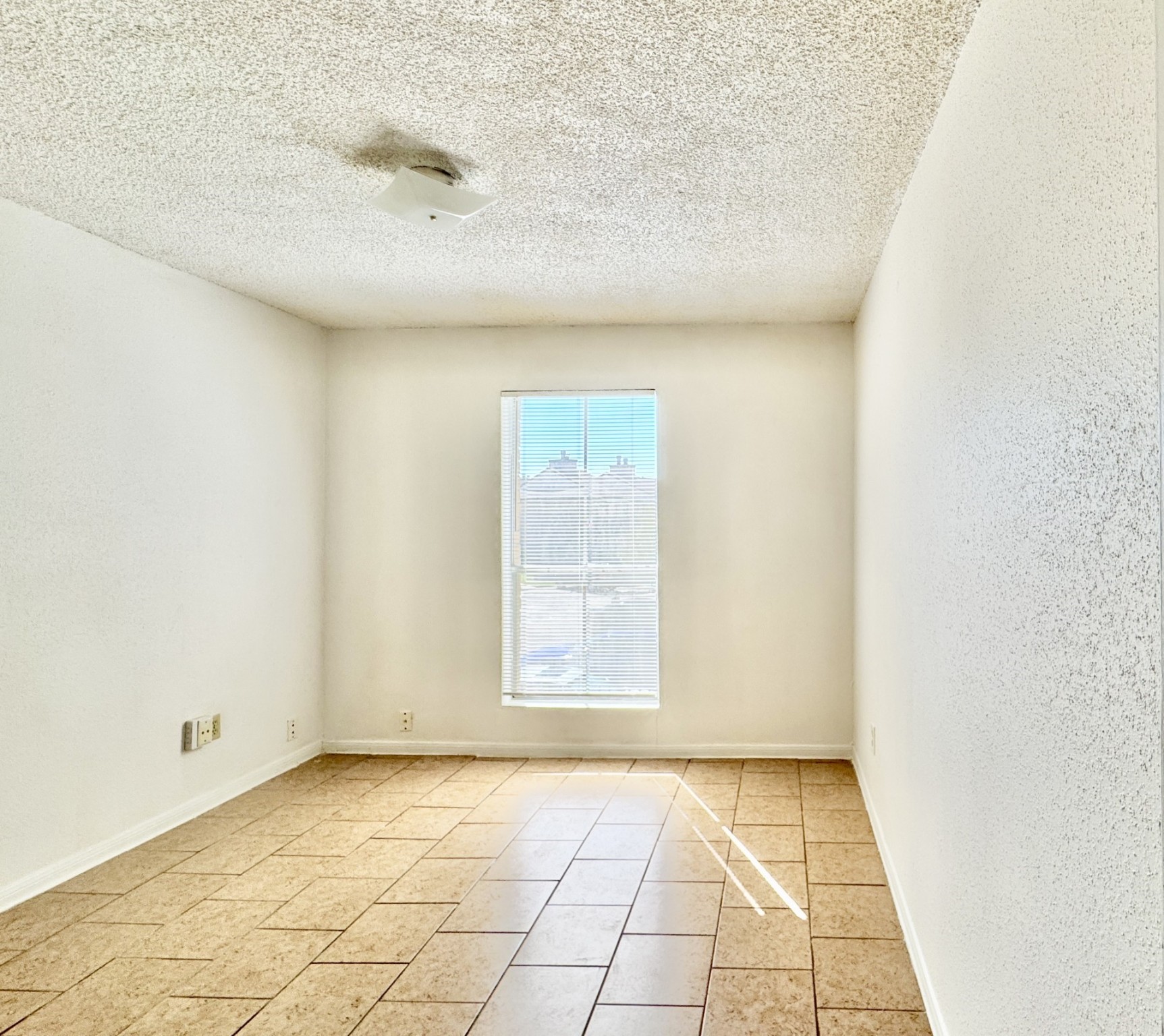 1516 Bay Area Boulevard, Unit U2 Houston, TX 77058 - Photo 10 of 15 a view of an empty room and window
