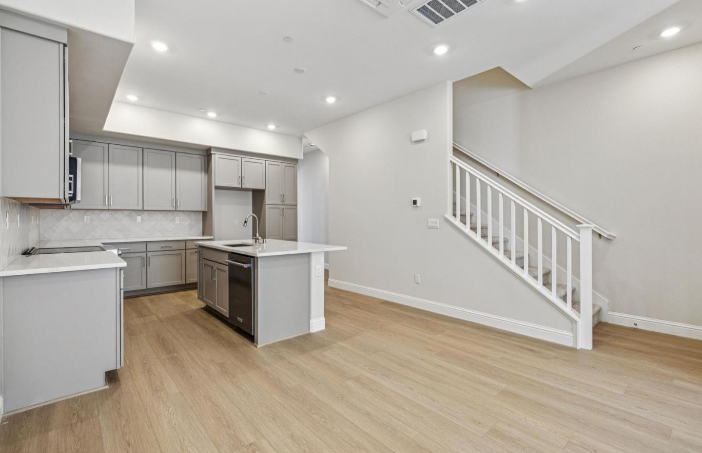 2417 Willow Way San Mateo, CA 94403 - Photo 11 of 34 a kitchen with a sink and wooden floor