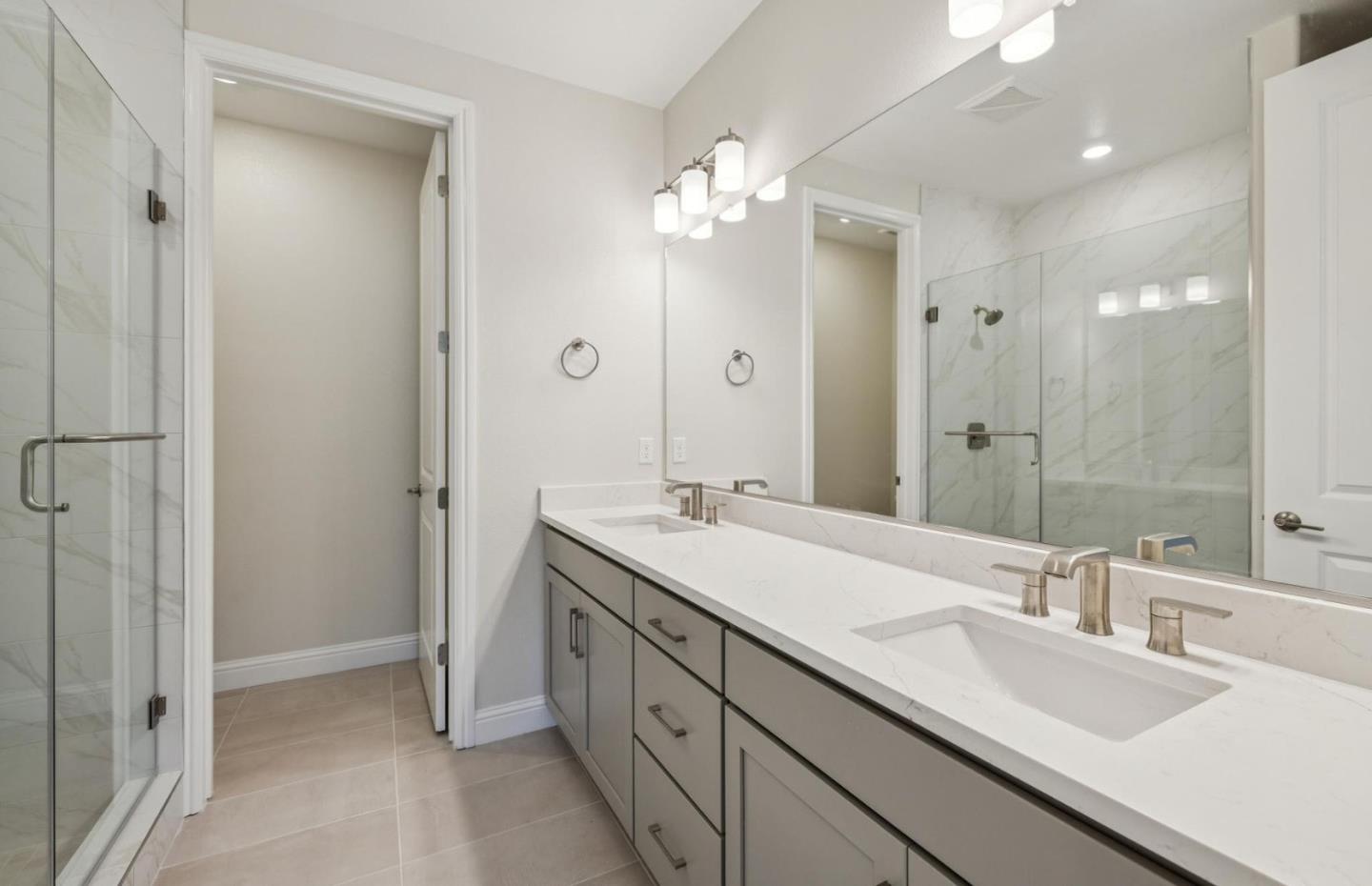 2417 Willow Way San Mateo, CA 94403 - Photo 29 of 34 a bathroom with a double vanity sink mirror and shower