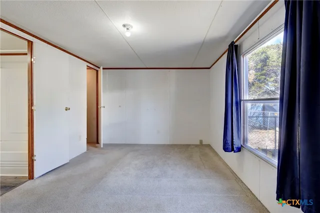 a utility room with a sink washer and dryer