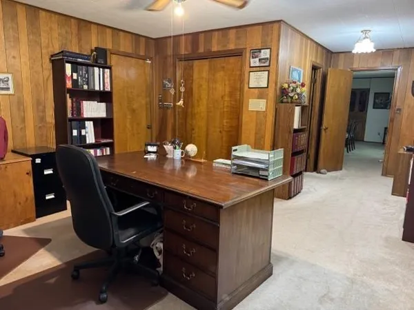 a view of a workspace with furniture