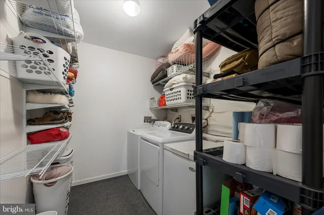 a bathroom with a shower and a sink